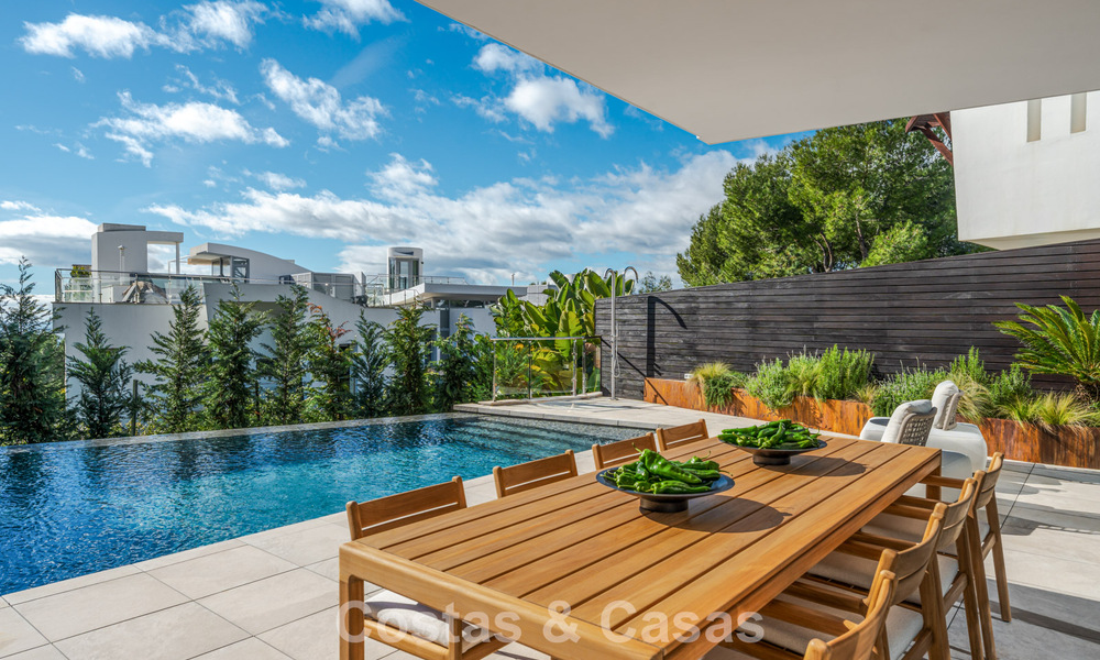 Modern semi-detached villa for sale with sublime sea views in a gated community in Sierra Blanca, Marbella’s Golden Mile 793044