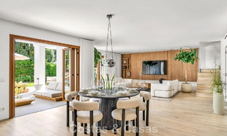 Elegant duplex apartment with private garden for sale, directly on the golf course in Nueva Andalucía, Marbella 793115 