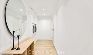 Elegant duplex apartment with private garden for sale, directly on the golf course in Nueva Andalucía, Marbella 793121 