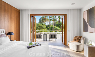 Elegant duplex apartment with private garden for sale, directly on the golf course in Nueva Andalucía, Marbella 793126 