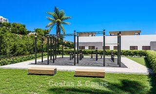 Launch! Modern semi-detached villas with sea views for sale in an exclusive resort-style development in Elviria, East Marbella 793132 