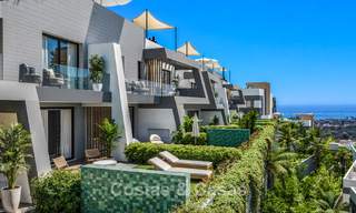 Launch! Modern semi-detached villas with sea views for sale in an exclusive resort-style development in Elviria, East Marbella 793133 