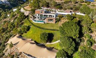 Modern architectural villa with sea views and a profesional gym for sale in El Madroñal, Benahavís - Marbella 793724 