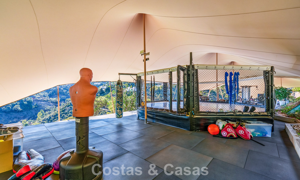 Modern architectural villa with sea views and a profesional gym for sale in El Madroñal, Benahavís - Marbella 793727