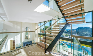 Modern architectural villa with sea views and a profesional gym for sale in El Madroñal, Benahavís - Marbella 793745 