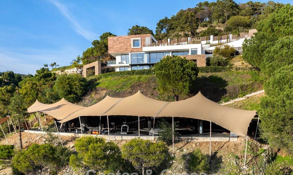 Modern architectural villa with sea views and a profesional gym for sale in El Madroñal, Benahavís - Marbella 793757