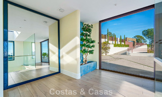 Modern architectural villa with sea views and a profesional gym for sale in El Madroñal, Benahavís - Marbella 793759 