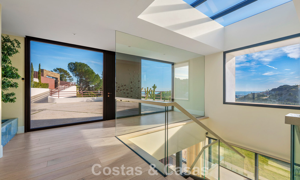 Modern architectural villa with sea views and a profesional gym for sale in El Madroñal, Benahavís - Marbella 793760