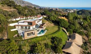 Modern architectural villa with sea views and a profesional gym for sale in El Madroñal, Benahavís - Marbella 793761 