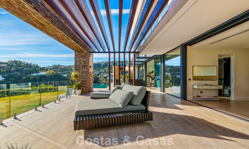 Modern architectural villa with sea views and a profesional gym for sale in El Madroñal, Benahavís - Marbella 793762