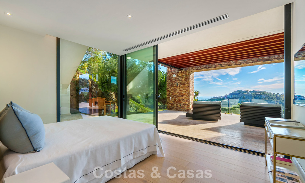 Modern architectural villa with sea views and a profesional gym for sale in El Madroñal, Benahavís - Marbella 793763