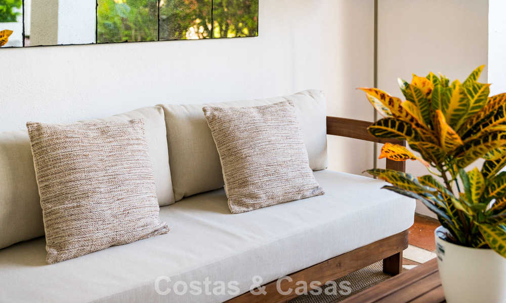 Stylish apartment with private garden for sale in a gated community in Sierra Blanca, Marbella 793875