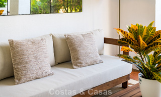 Stylish apartment with private garden for sale in a gated community in Sierra Blanca, Marbella 793875 