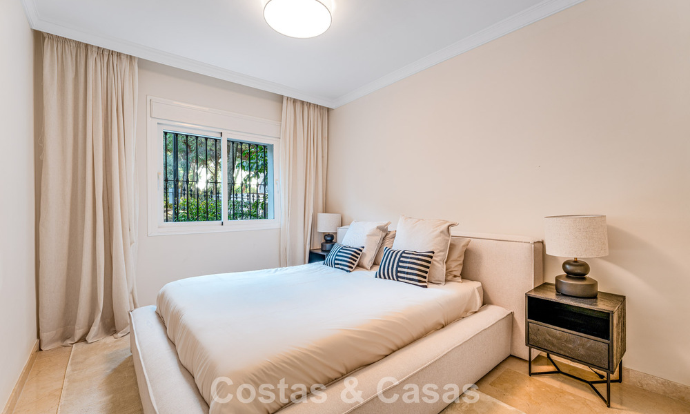 Stylish apartment with private garden for sale in a gated community in Sierra Blanca, Marbella 793879