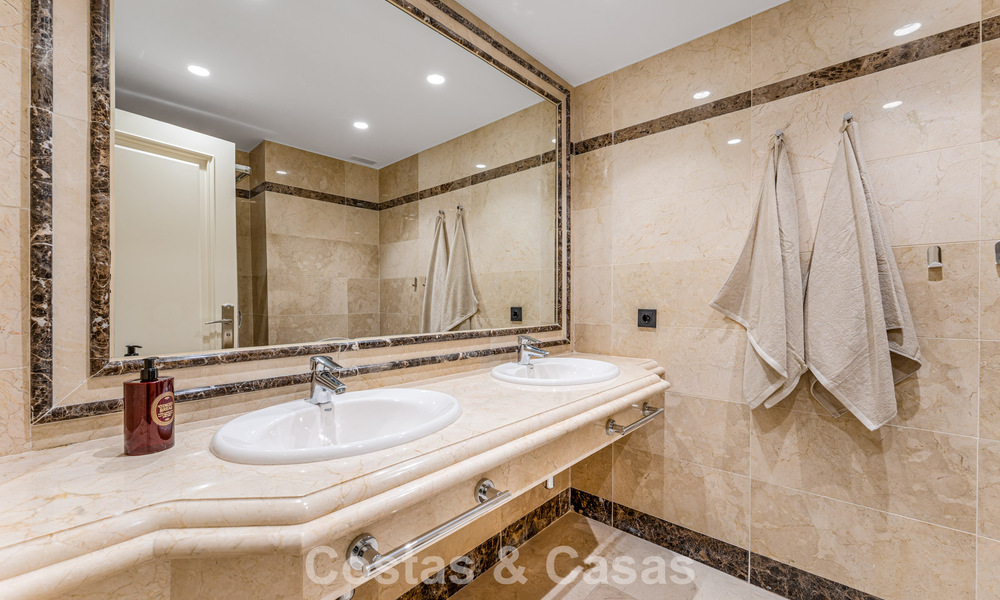 Stylish apartment with private garden for sale in a gated community in Sierra Blanca, Marbella 793880