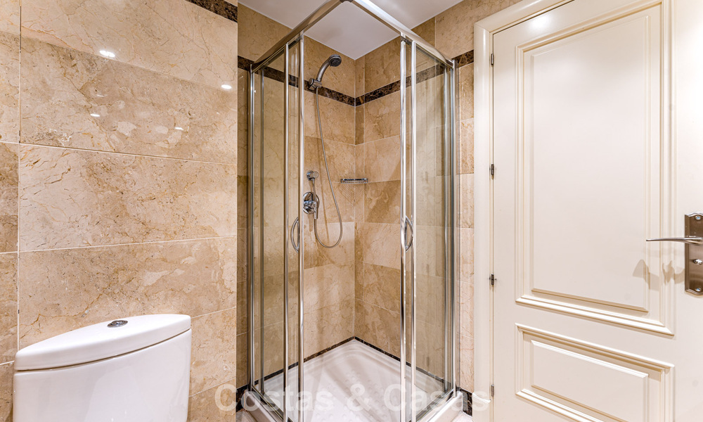 Stylish apartment with private garden for sale in a gated community in Sierra Blanca, Marbella 793881