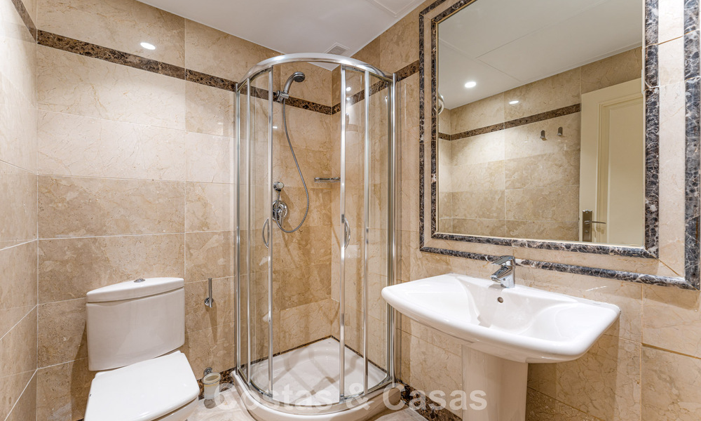 Stylish apartment with private garden for sale in a gated community in Sierra Blanca, Marbella 793883