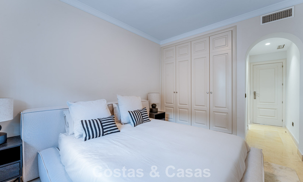 Stylish apartment with private garden for sale in a gated community in Sierra Blanca, Marbella 793889