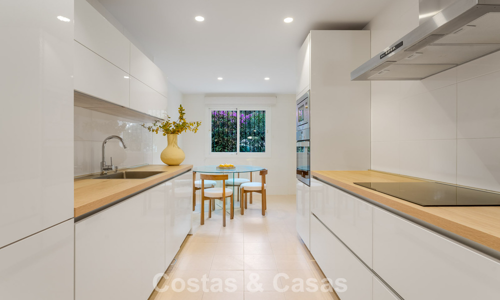 Stylish apartment with private garden for sale in a gated community in Sierra Blanca, Marbella 793897