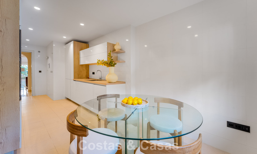 Stylish apartment with private garden for sale in a gated community in Sierra Blanca, Marbella 793899