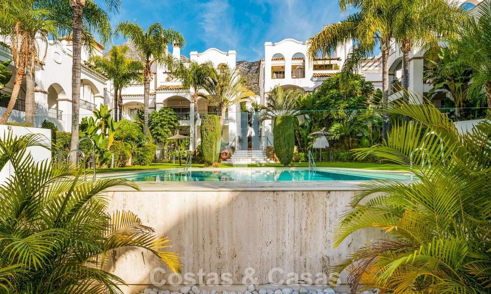 Stylish apartment with private garden for sale in a gated community in Sierra Blanca, Marbella 793903