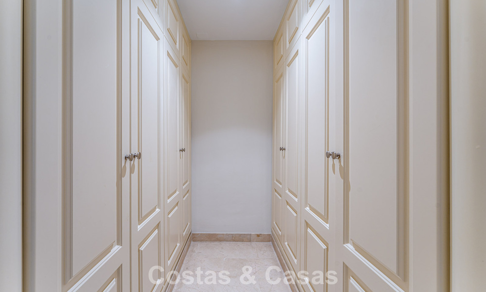 Stylish apartment with private garden for sale in a gated community in Sierra Blanca, Marbella 793905