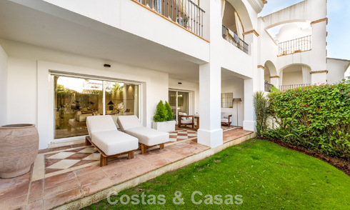 Stylish apartment with private garden for sale in a gated community in Sierra Blanca, Marbella 793909