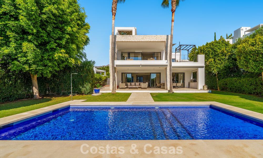 Luxury villa with contemporary architecture for sale in a gated private community of Nueva Andalucía, Marbella 793981