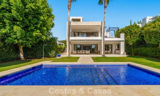 Luxury villa with contemporary architecture for sale in a gated private community of Nueva Andalucía, Marbella 793981 