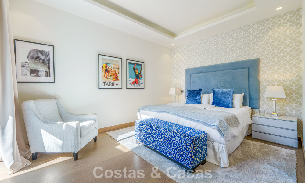 Luxury villa with contemporary architecture for sale in a gated private community of Nueva Andalucía, Marbella 793983