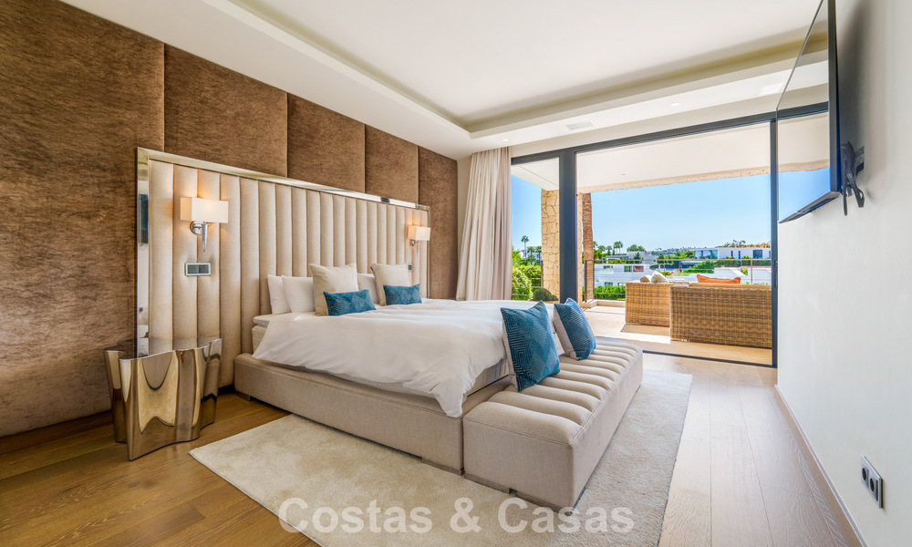 Luxury villa with contemporary architecture for sale in a gated private community of Nueva Andalucía, Marbella 793986