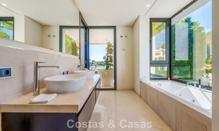 Luxury villa with contemporary architecture for sale in a gated private community of Nueva Andalucía, Marbella 793988 