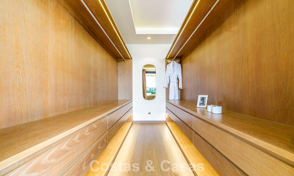 Luxury villa with contemporary architecture for sale in a gated private community of Nueva Andalucía, Marbella 793989