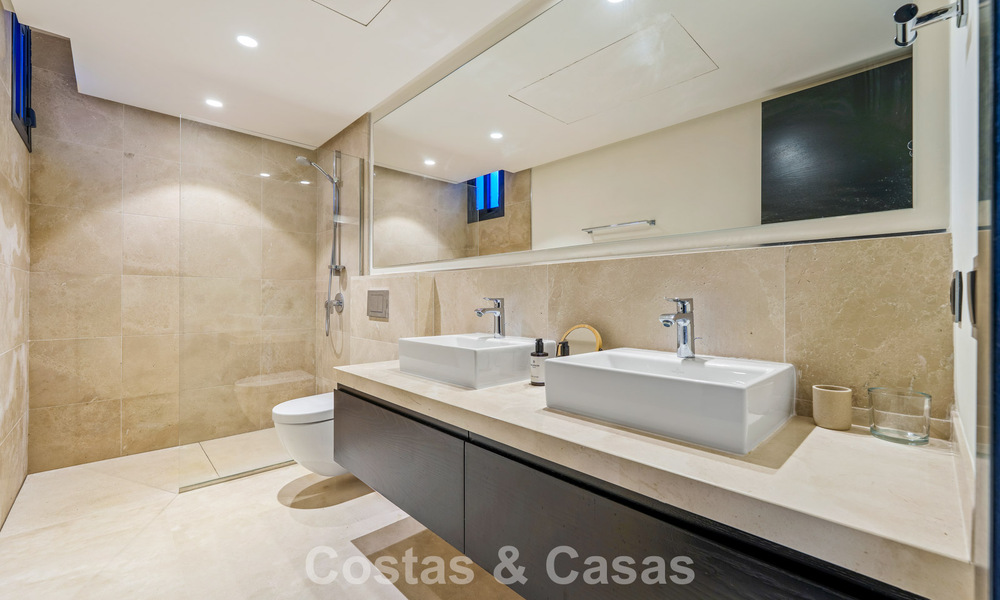 Luxury villa with contemporary architecture for sale in a gated private community of Nueva Andalucía, Marbella 793996