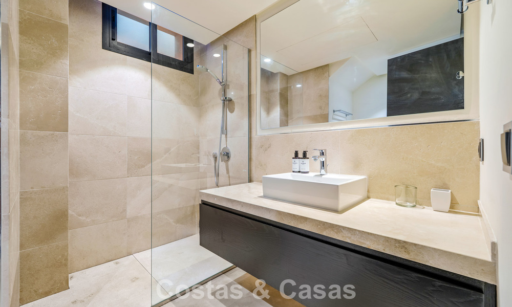 Luxury villa with contemporary architecture for sale in a gated private community of Nueva Andalucía, Marbella 793998