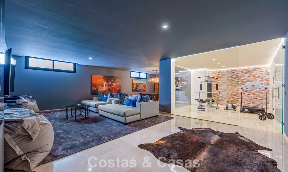 Luxury villa with contemporary architecture for sale in a gated private community of Nueva Andalucía, Marbella 793999