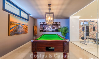 Luxury villa with contemporary architecture for sale in a gated private community of Nueva Andalucía, Marbella 794002 