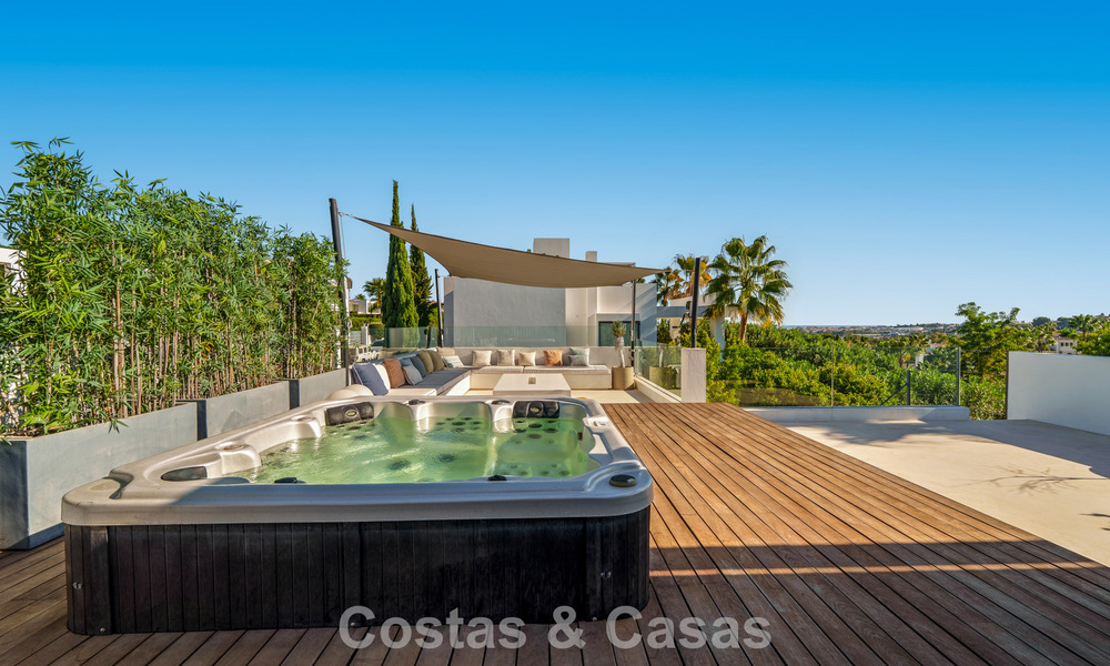 Luxury villa with contemporary architecture for sale in a gated private community of Nueva Andalucía, Marbella 794008