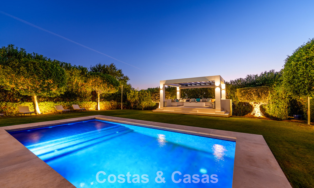 Luxury villa with contemporary architecture for sale in a gated private community of Nueva Andalucía, Marbella 794016