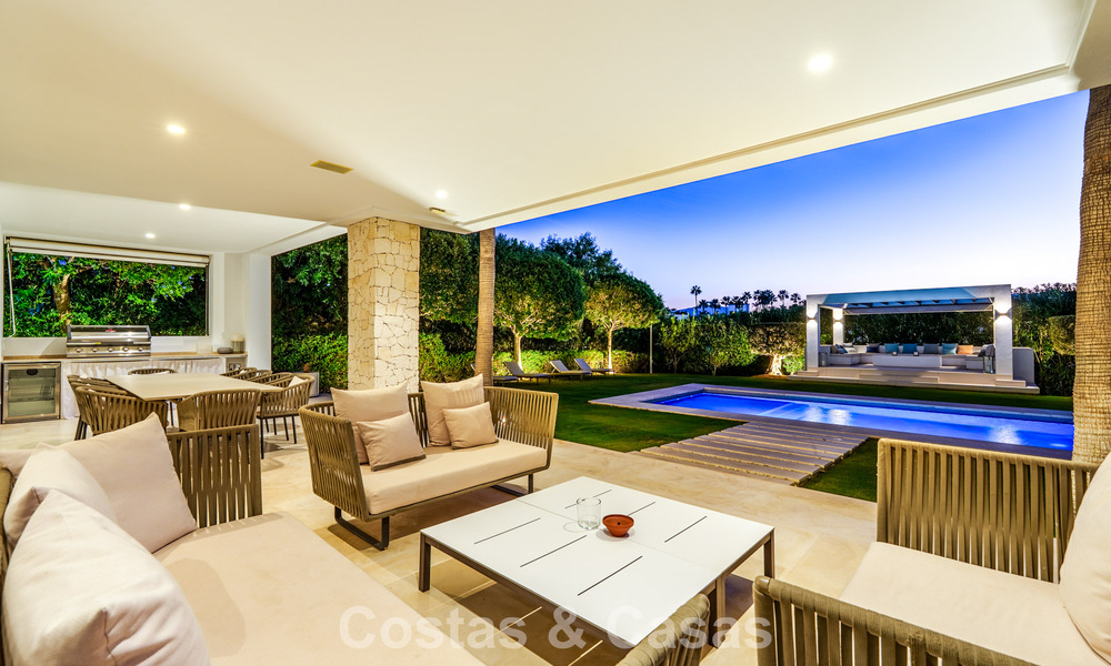 Luxury villa with contemporary architecture for sale in a gated private community of Nueva Andalucía, Marbella 794017