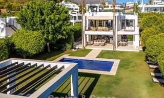 Luxury villa with contemporary architecture for sale in a gated private community of Nueva Andalucía, Marbella 794019 