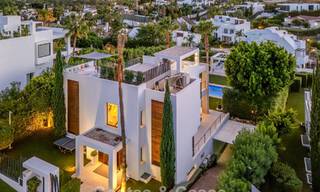 Luxury villa with contemporary architecture for sale in a gated private community of Nueva Andalucía, Marbella 794022 