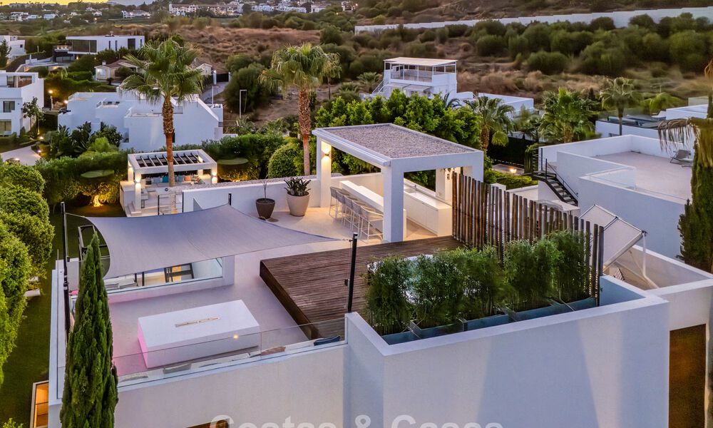 Luxury villa with contemporary architecture for sale in a gated private community of Nueva Andalucía, Marbella 794023