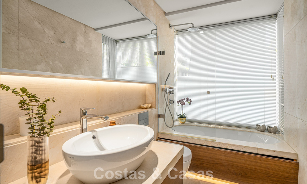 Prestigious, modern renovated, semi-detached villa for sale, second line beach in Puente Romano on Marbella’s Golden Mile 794451