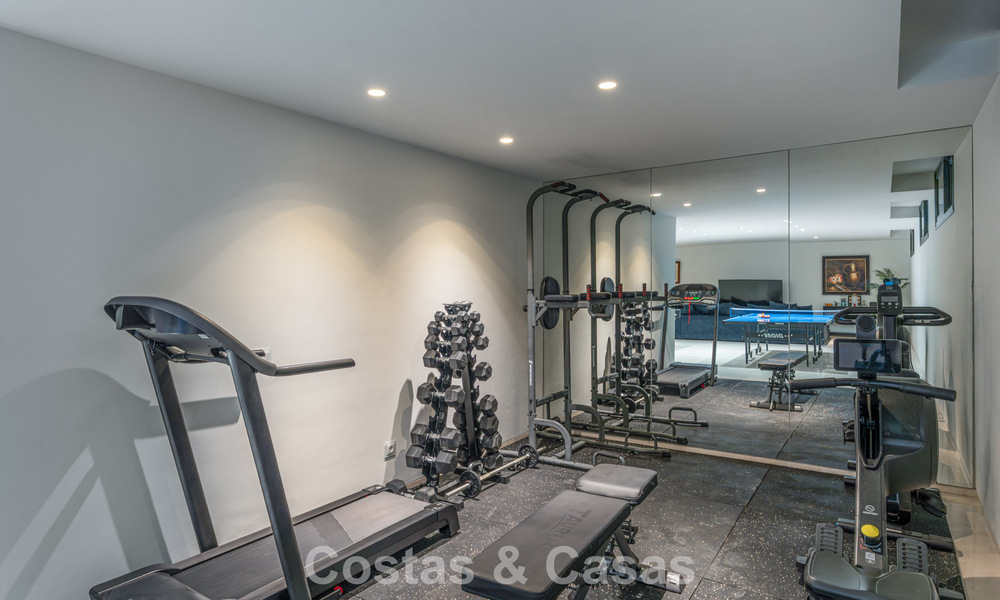 High-end designer villa with modern character for sale in a gated community in Nueva Andalucía’s Golf Valley, Marbella 794409