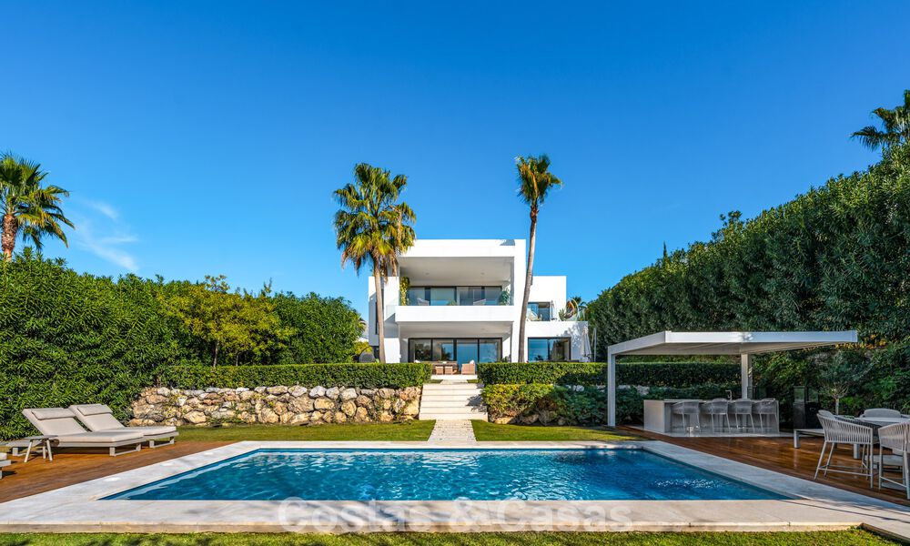 High-end designer villa with modern character for sale in a gated community in Nueva Andalucía’s Golf Valley, Marbella 794425