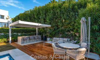 High-end designer villa with modern character for sale in a gated community in Nueva Andalucía’s Golf Valley, Marbella 794433 