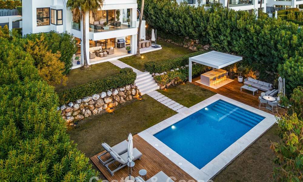 High-end designer villa with modern character for sale in a gated community in Nueva Andalucía’s Golf Valley, Marbella 794434