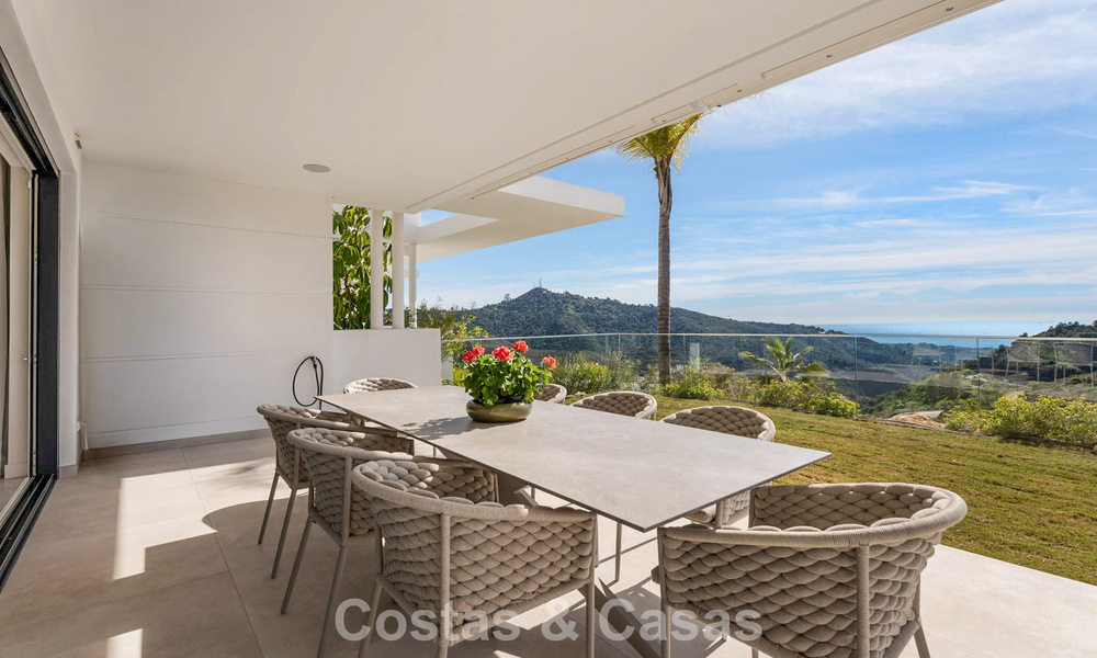 Modern, luxurious garden apartment for sale with panoramic coastal views in a gated boutique complex near Marbella town 794485