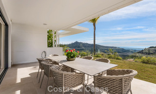 Modern, luxurious garden apartment for sale with panoramic coastal views in a gated boutique complex near Marbella town 794485 